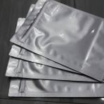 Bao zip mặt trong mặt bạc 22x32